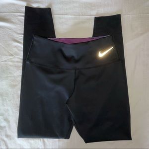 Women’s Nike Reversible Leggings. Size Small in Black/Blue and Purple.